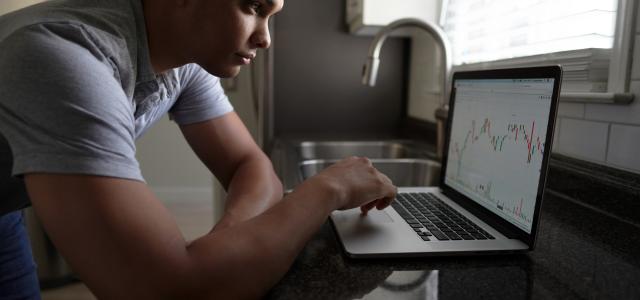 man in gray t-shirt using macbook pro by Joshua Mayo courtesy of Unsplash.